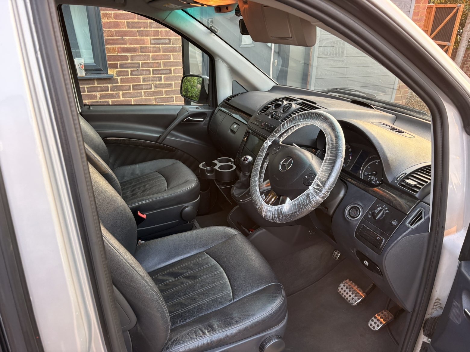 Mercedes Vito cab interior cleaned with protective steering wheel cover fitted