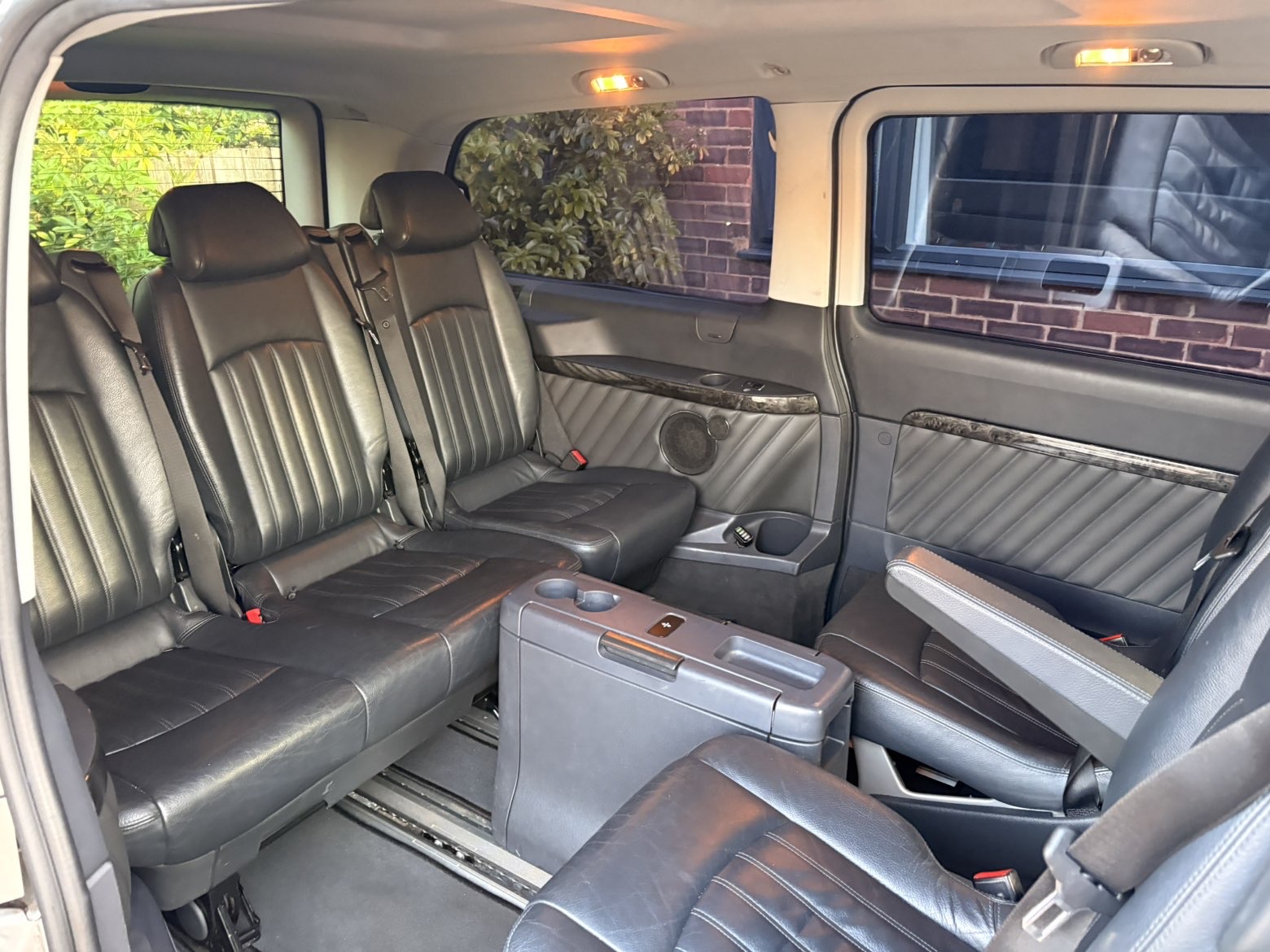 Rear leather seats of a Mercedes van after a full interior valet